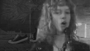 A screen shot/capture from its music video.